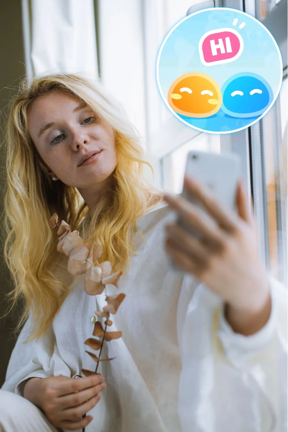Woman taking a video call on her phone beside the MateMet logo