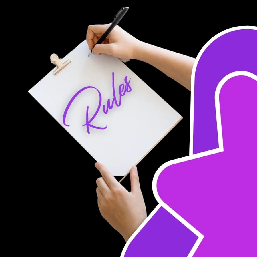 Hand writing the word Rules on paper